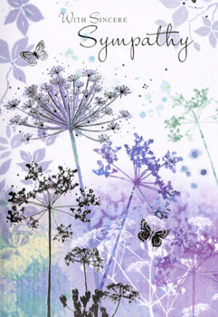 This sympathy card's design offers a moment of visual stillness, like pausing beside a quiet hedgerow just outside Cobham at first light. The entire illustration is composed in soothing layers of cool colour: soft lavenders, misty blues, and muted purples sweep across the background, with whispers of silvery green near the lower portion to suggest distant foliage or grass. From this gentle base, tall, fine stems emerge, each one ending in a delicate umbel of tiny blooms. These umbelliferous flower heads are drawn with an almost filigree quality, their small clustered florets opening like tiny stars, especially at the top of the composition where they appear to merge with the pale sky. There is an intentional lightness to the way the petals and seed heads are rendered; some edges are left unfinished, allowing the paper's white to mix with the colour, conveying an impression of airy movement, much like the way wildflowers sway in a soft breeze along the lanes towards Ockham and Downside. Among the blooms, two or three butterflies hover, their wings softly tinted in layers of pale violet and cool blue, edges blurred slightly so they feel part of the same gentle atmosphere rather than separate objects. There is no sharp focus here, only a subtle, diffused glow that rests over the entire scene, echoing the quiet mood of remembrance. The image has a meditative rhythm, encouraging the eye to travel slowly from stem to blossom to butterfly. Above this serene arrangement, a simple message of sympathy is scripted with restraint, offering a space for personal reflection. As someone who helps families in Cobham choose both flowers and cards for funerals and memorials, I sense how this artwork honours grief with sensitivity, providing comfort through nature's quiet endurance.