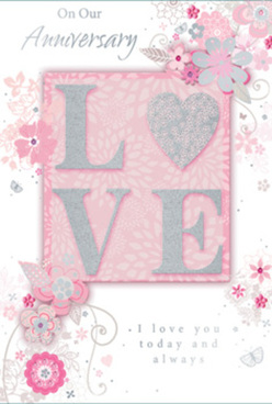 A softly romantic anniversary card is shown, its design composed in powdery blush pinks, creamy whites, and silvery accents that echo the quiet sophistication of Cobham's village streets. At the heart of the card, the word "LOVE" appears in large, raised letters, elegantly coated with a fine layer of glitter. The surface of each letter looks slightly textured, offering a pleasant tactile contrast to the smooth card beneath, the way textured petals stand out in a carefully arranged anniversary bouquet. This central motif rests on a gently glowing pink background that suggests warmth and tenderness rather than bold drama. Surrounding the word, an airy halo of illustrated blooms and slender, curling leaves drifts across the surface. The flowers are stylised rather than realistic, drawn with thin, sweeping lines in blush, white, and hints of silver, similar to the artistic sketches a Cobham florist might make before assembling a romantic arrangement for delivery to nearby neighbourhoods like Stoke D'Abernon or Downside. These flowing lines twist and spiral gracefully, adding a sense of lightness and movement, like a soft breeze through a riverside garden. Tiny flourishes-petals, dots, and filigree swirls-fill the spaces between blossoms, creating a fine lacework of detail that never overwhelms the eye. Within this floral frame, an elegantly scripted anniversary message about cherishing love "today and always" is written in refined calligraphy, its curls and loops harmonising with the surrounding vines and petals. The overall impression is of gentle, enduring romance, captured on paper in the same thoughtful way Flower Delivery Cobham composes its bouquets for special milestones.