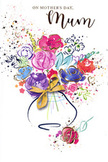 Expressive Mother's Day card artwork featuring a colourful watercolour bouquet rising from a simple vase, portrayed with the relaxed elegance you might expect from a Cobham florist who loves artistic detail. At its core, large blossoms in rich cerise and warm fuchsia open like fully blown roses, their petals given subtle definition with deep indigo lines that add depth and structure to the otherwise free-flowing paint. Surrounding these statement flowers are softer blooms in lavender, powder blue and peachy tones, their shapes implied through layered washes where colours gently mingle, much like mixed borders in local gardens around Painshill and Downside. Glimmering accents of gold trace the outlines of select petals and leaves, catching imagined light and lending the bouquet a quiet, celebratory shimmer. The background is bright white, dotted with splashes of colour and tiny heart motifs drifting outward from the centre, giving the impression of petals scattered by a warm breeze along Cobham's quiet lanes. Anchoring the composition, a loosely painted vase curves in gentle strokes at the base, finished with a slim golden bow that recalls the careful tying of satin ribbon on a freshly prepared gift bouquet. The overall design feels airy and uplifting yet deeply sincere, blending spontaneity with thoughtful composition. This Mother's Day card turns the sentiment of giving flowers into a lasting image of affection and appreciation, an ideal partner to fresh blooms delivered throughout Cobham to honour the special bond between mother and child.